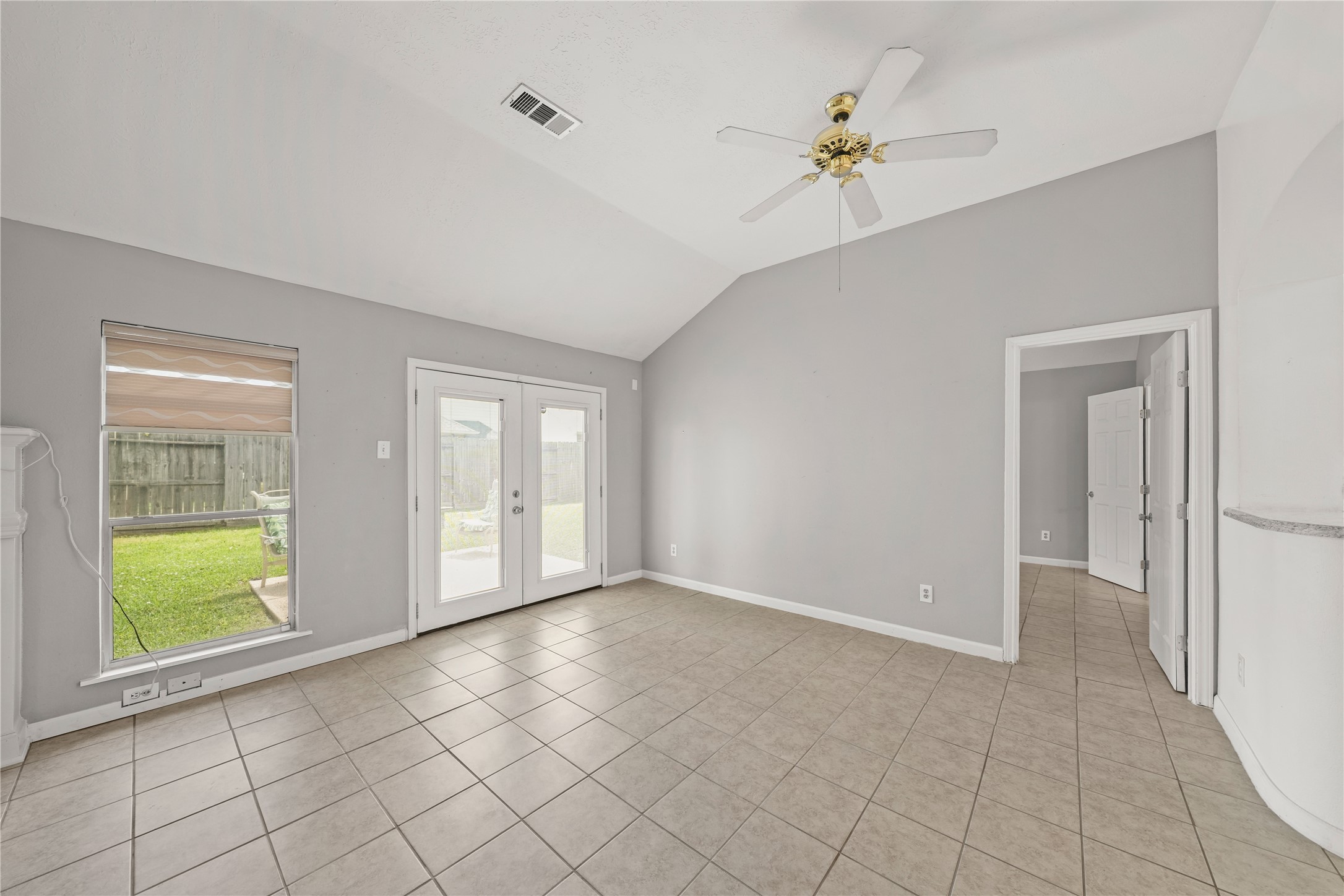 8134 Blue Jay Street Baytown, TX 77523 - Photo 13 of 31 a view of an empty room with a window