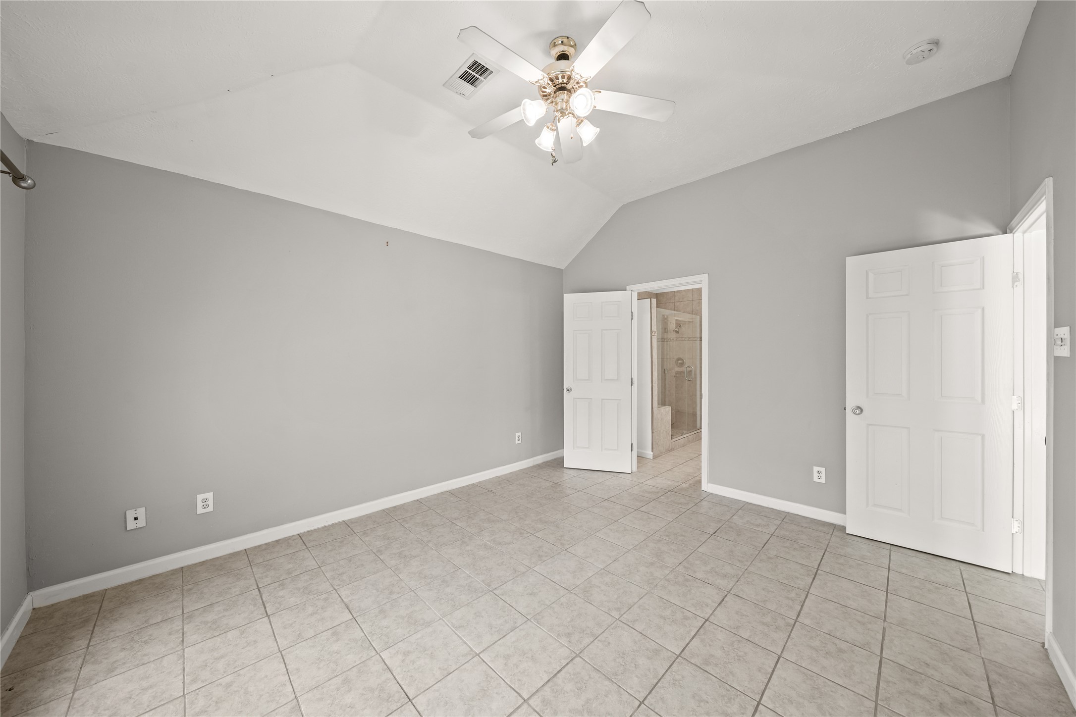 8134 Blue Jay Street Baytown, TX 77523 - Photo 20 of 31 a view of an empty room with a ceiling fan