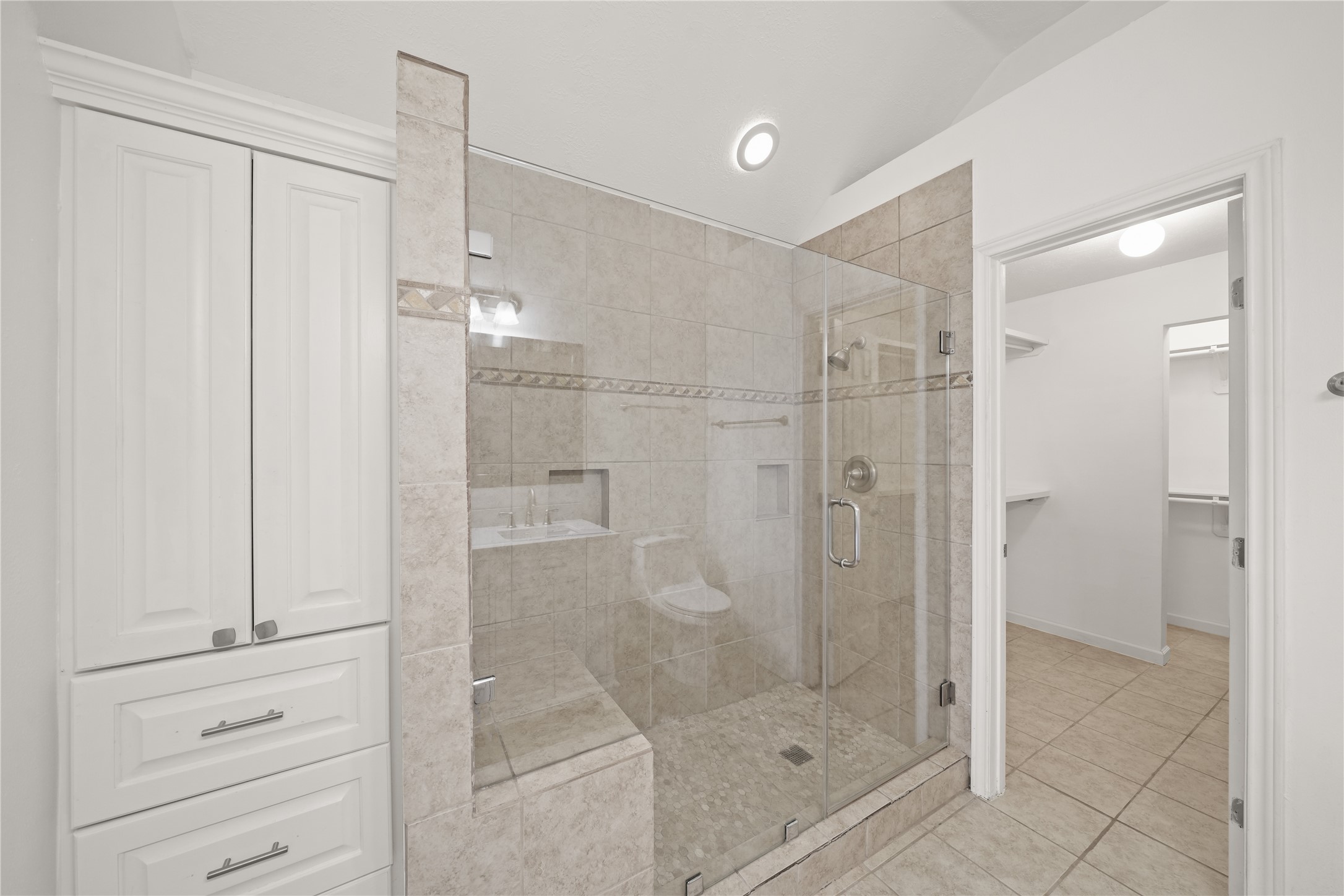 8134 Blue Jay Street Baytown, TX 77523 - Photo 21 of 31 a bathroom with a shower