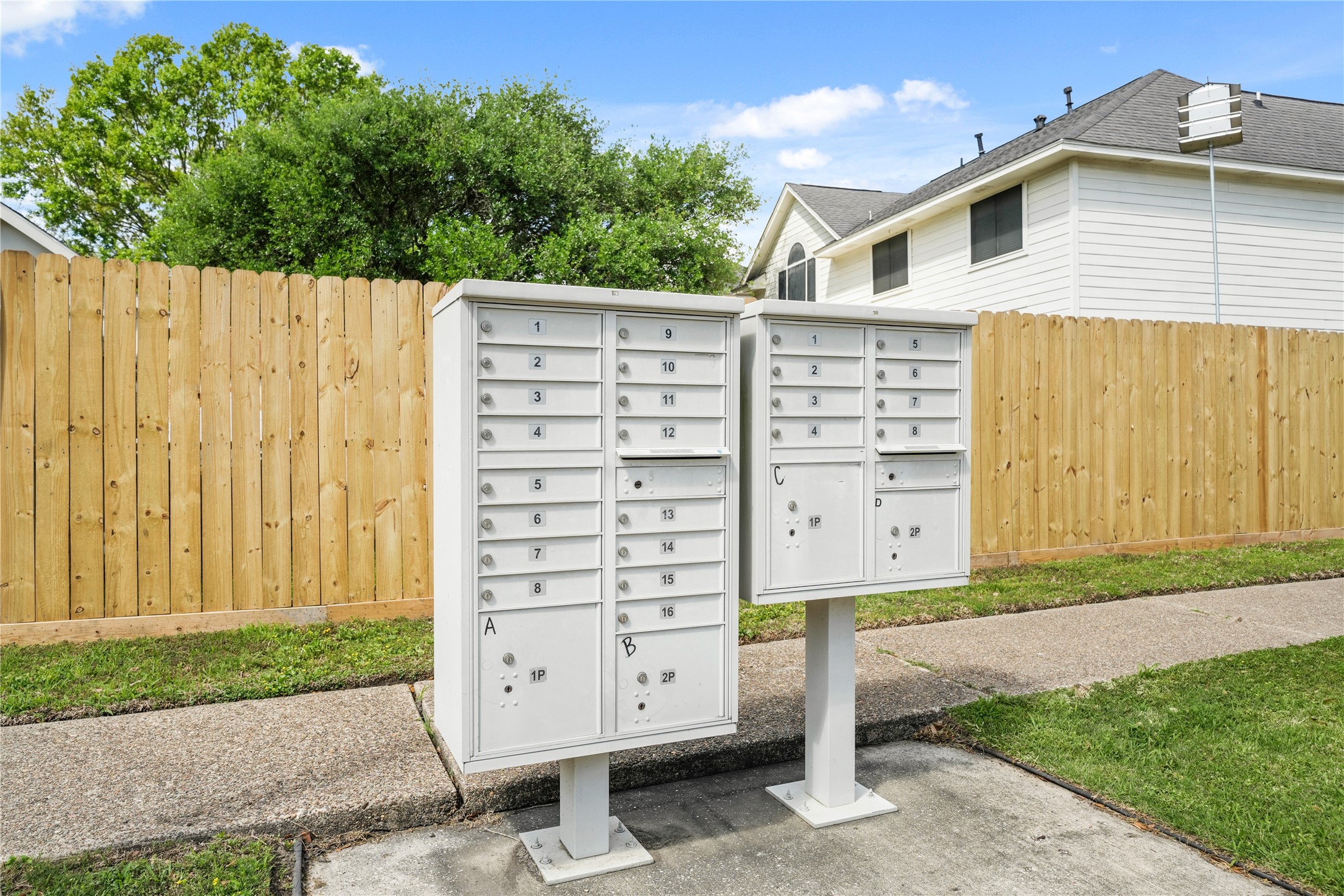 8134 Blue Jay Street Baytown, TX 77523 - Photo 31 of 31 a view of a wooden house with a yard and stairs