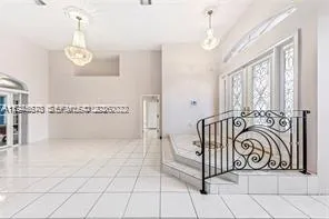 a view of a hallway with entryway