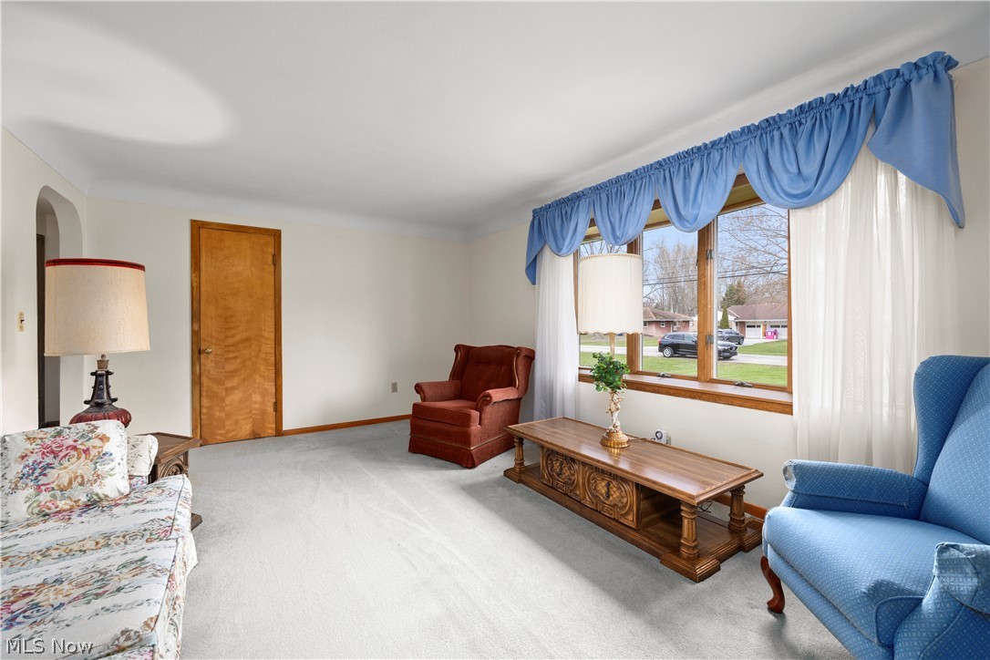 36141 Aurensen Road North Ridgeville, OH 44039 - Photo 2 of 24 Living room with light carpet & Bay window
hardwood floors under carpet