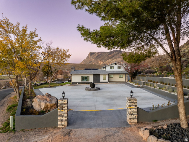 476 Spring Drive Toquerville, UT 84774 - Photo 86 of 95 Traditional-style house with roof mounted solar panels and a mountain view