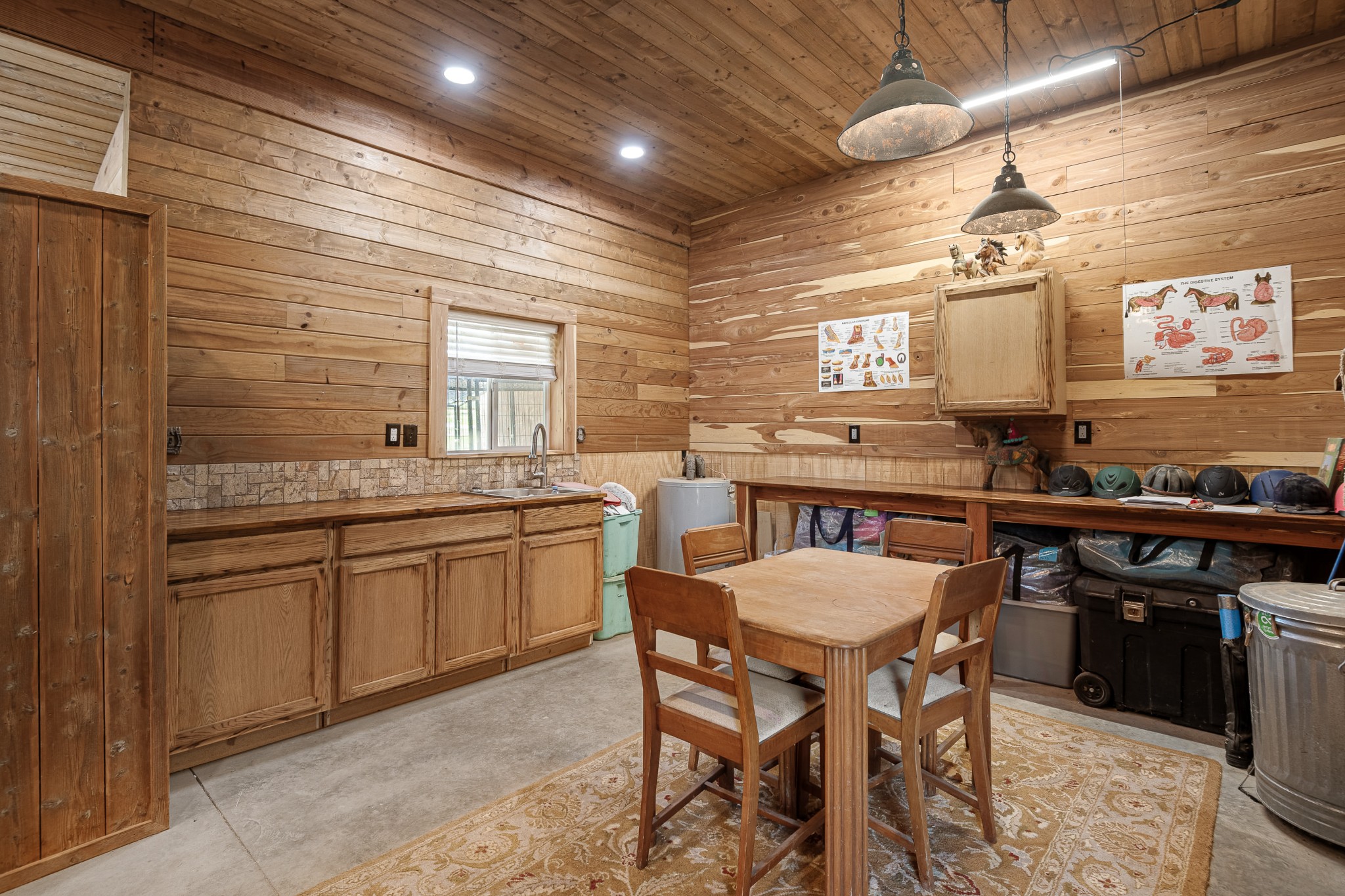 642 Beach Bottom Road Watertown, TN 37184 - Photo 34 of 48 a kitchen with a sink and chairs