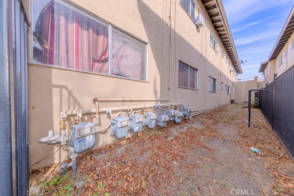 906 South Fann Street Anaheim, CA 92804 - Photo 13 of 27 a view of a pathway along with house