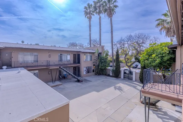 a room with a window and shelf
