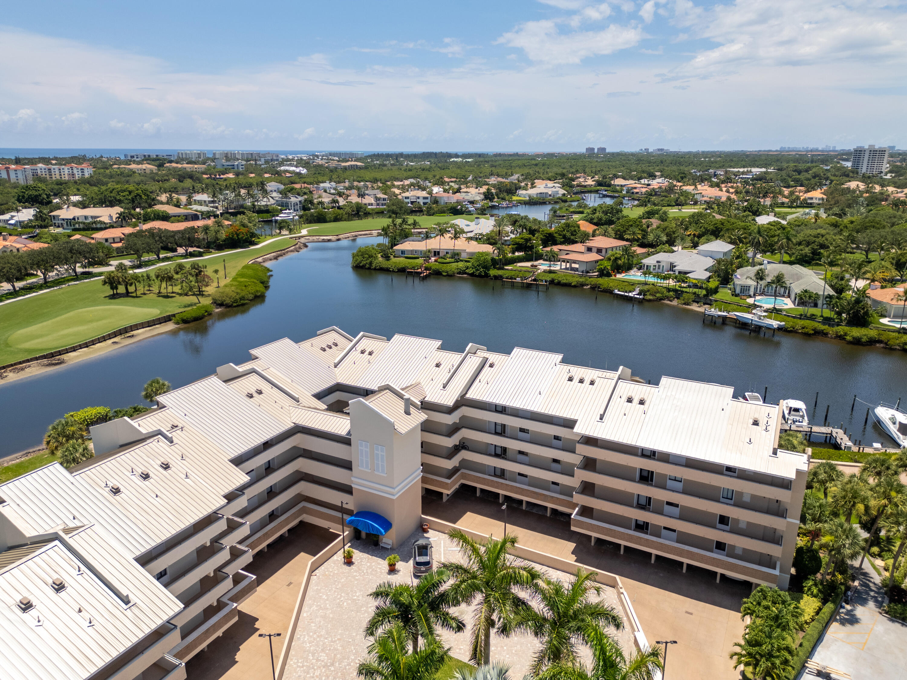 16940 Bay Street, Unit N504 Jupiter, FL 33477 - Photo 1 of 33 an aerial view of a houses with a lake view