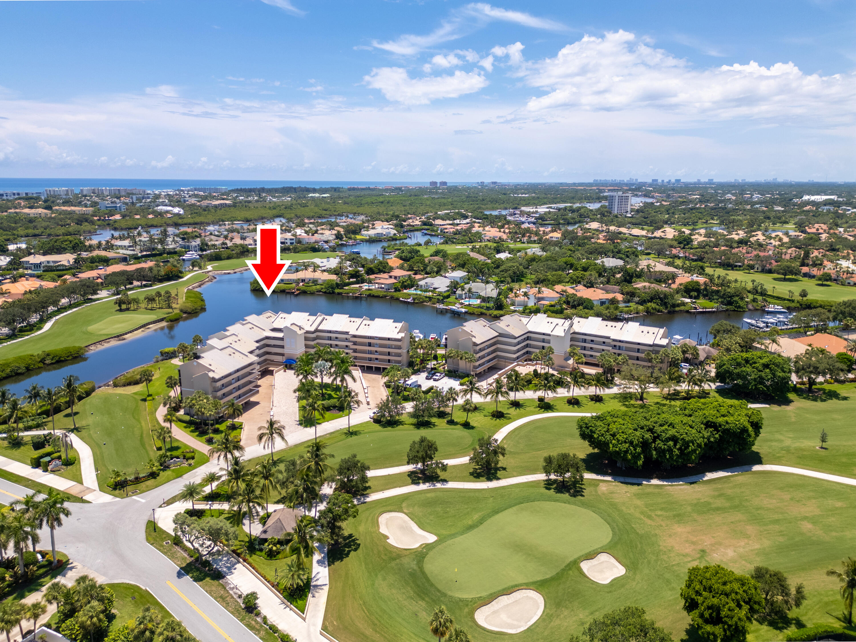 16940 Bay Street, Unit N504 Jupiter, FL 33477 - Photo 2 of 33 an aerial view of residential houses with outdoor space