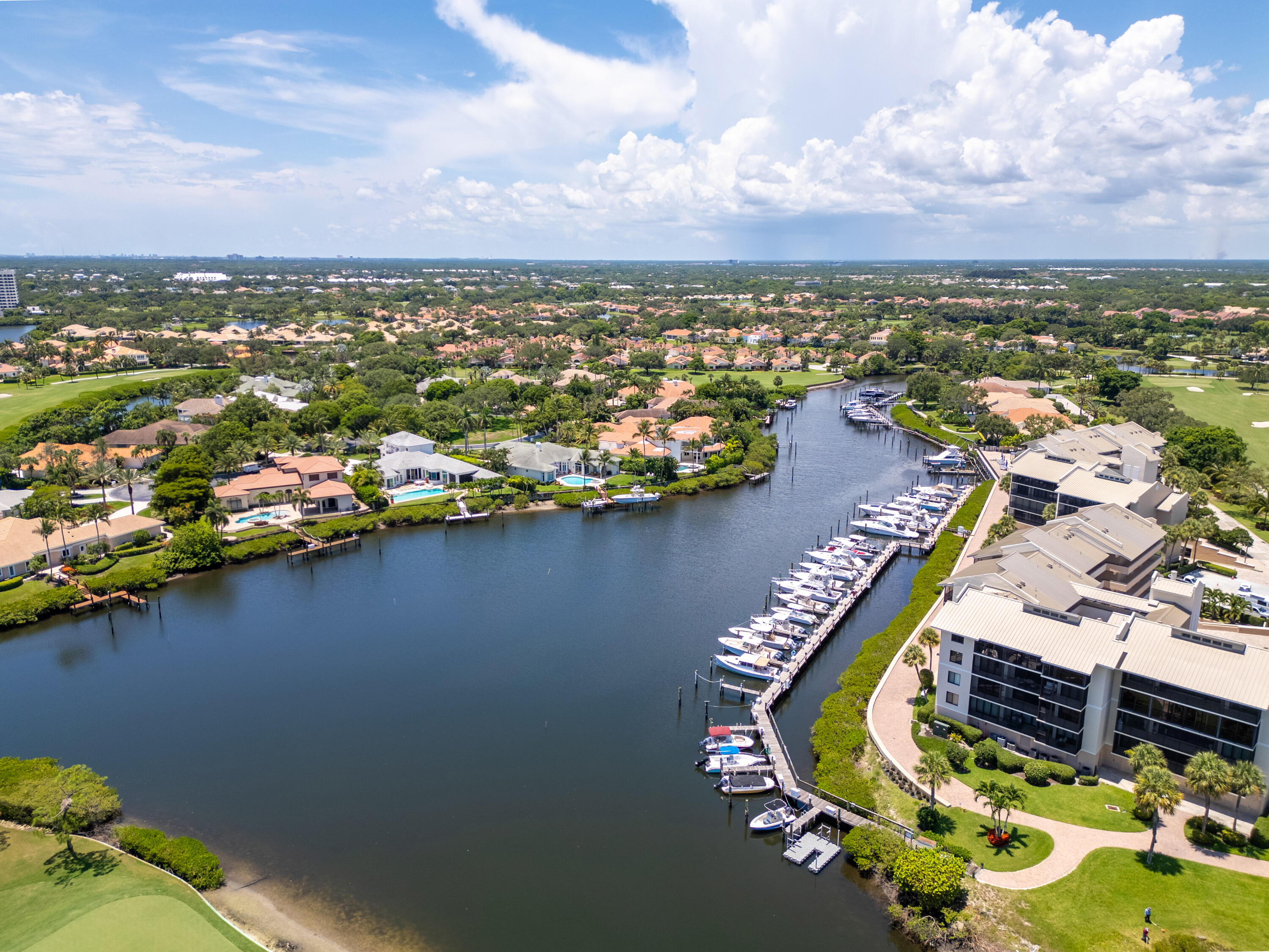 16940 Bay Street, Unit N504 Jupiter, FL 33477 - Photo 31 of 33 an aerial view of residential houses with outdoor space and lake view