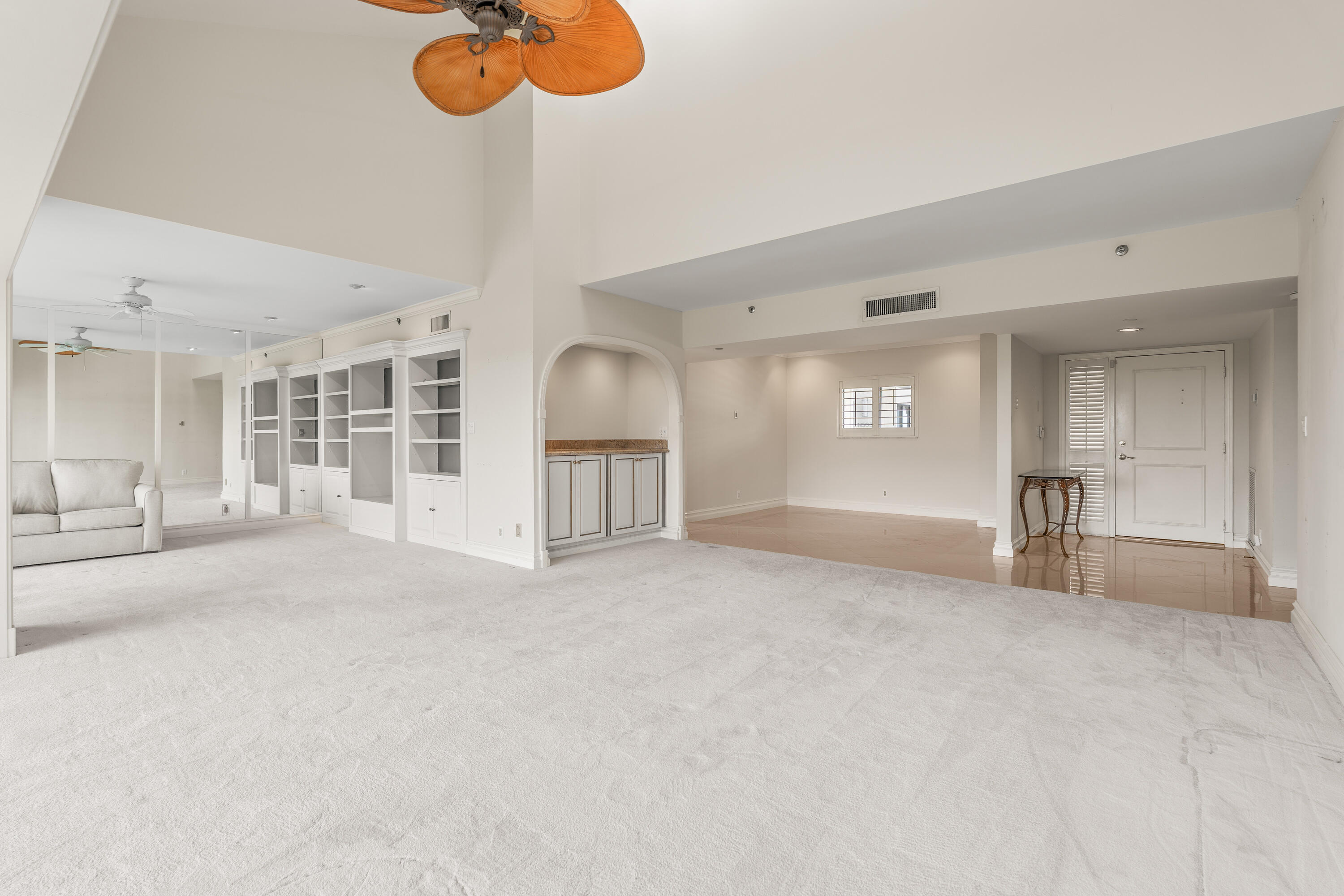 16940 Bay Street, Unit N504 Jupiter, FL 33477 - Photo 7 of 33 a view of empty room with wooden floor