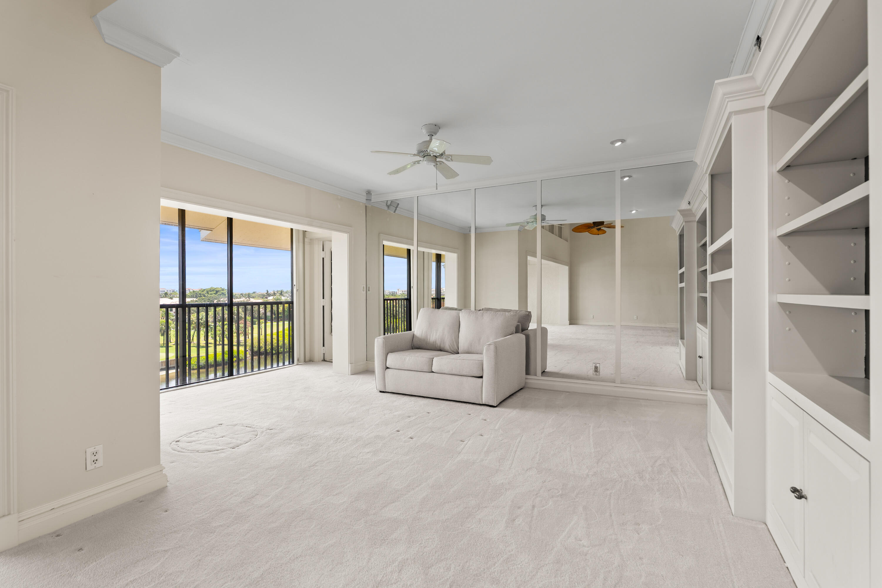 16940 Bay Street, Unit N504 Jupiter, FL 33477 - Photo 8 of 33 a living room with furniture and a large window