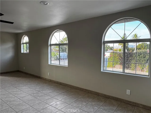 an empty room that has a window