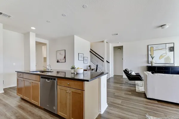 a view of a dining room with furniture and window