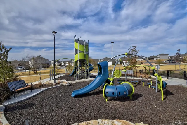 a view of a park with a slide