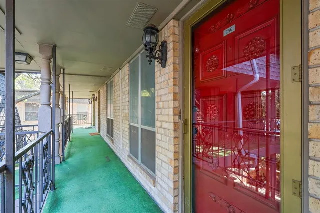 a balcony with view of wooden balcony