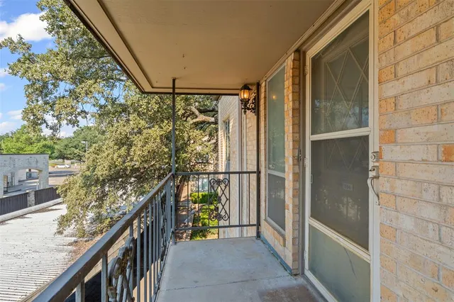a swimming pool with outdoor seating and yard