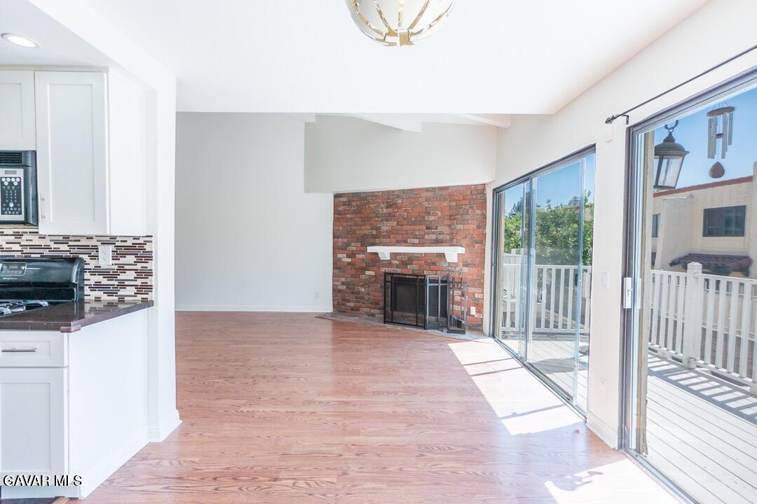 18452 Lemarsh Street, Unit 48 Northridge, CA 91325 - Photo 15 of 45 a view of living room with furniture and fireplace