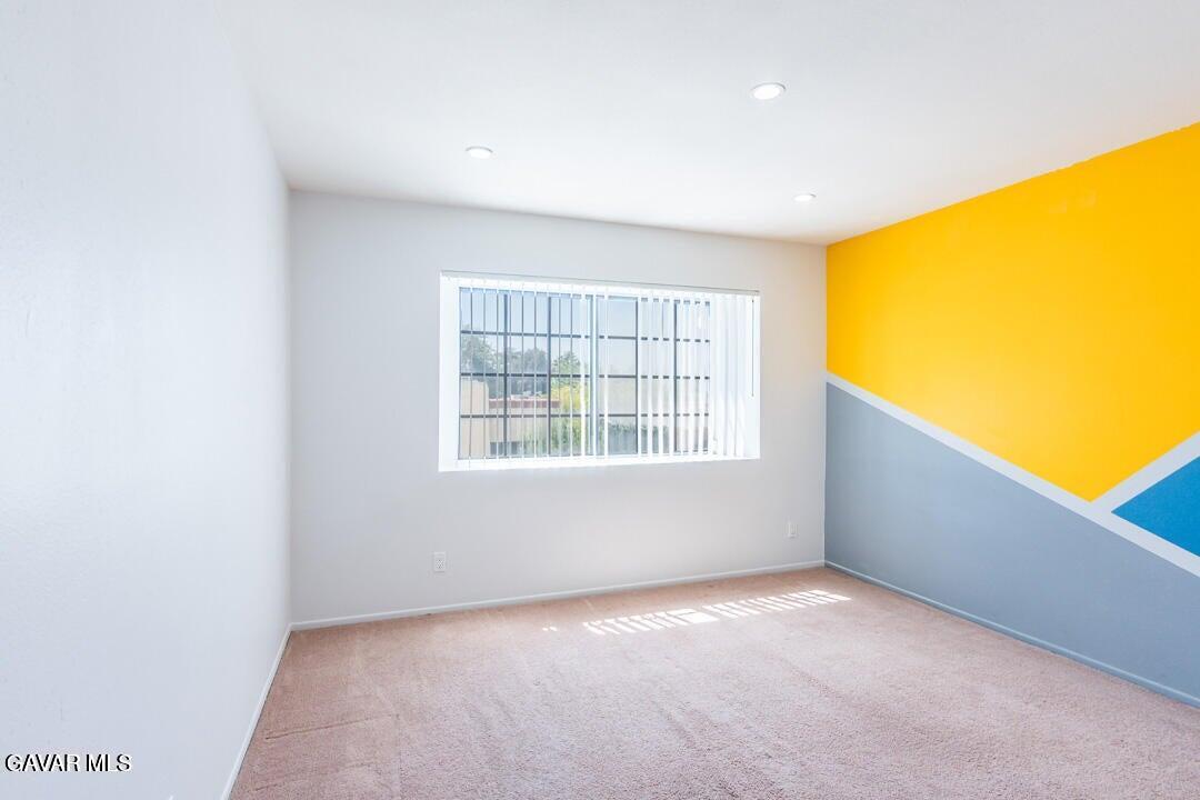 18452 Lemarsh Street, Unit 48 Northridge, CA 91325 - Photo 21 of 45 a view of an empty room with a window