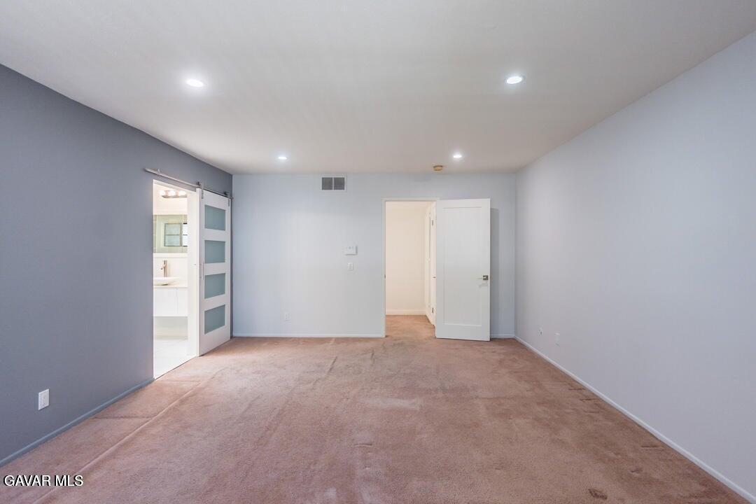 18452 Lemarsh Street, Unit 48 Northridge, CA 91325 - Photo 28 of 45 a view of an empty room with a window