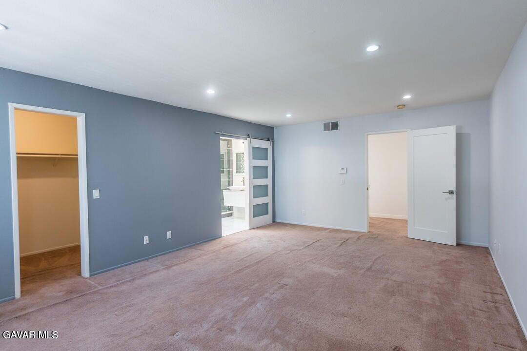 18452 Lemarsh Street, Unit 48 Northridge, CA 91325 - Photo 29 of 45 a view of an empty room with a window
