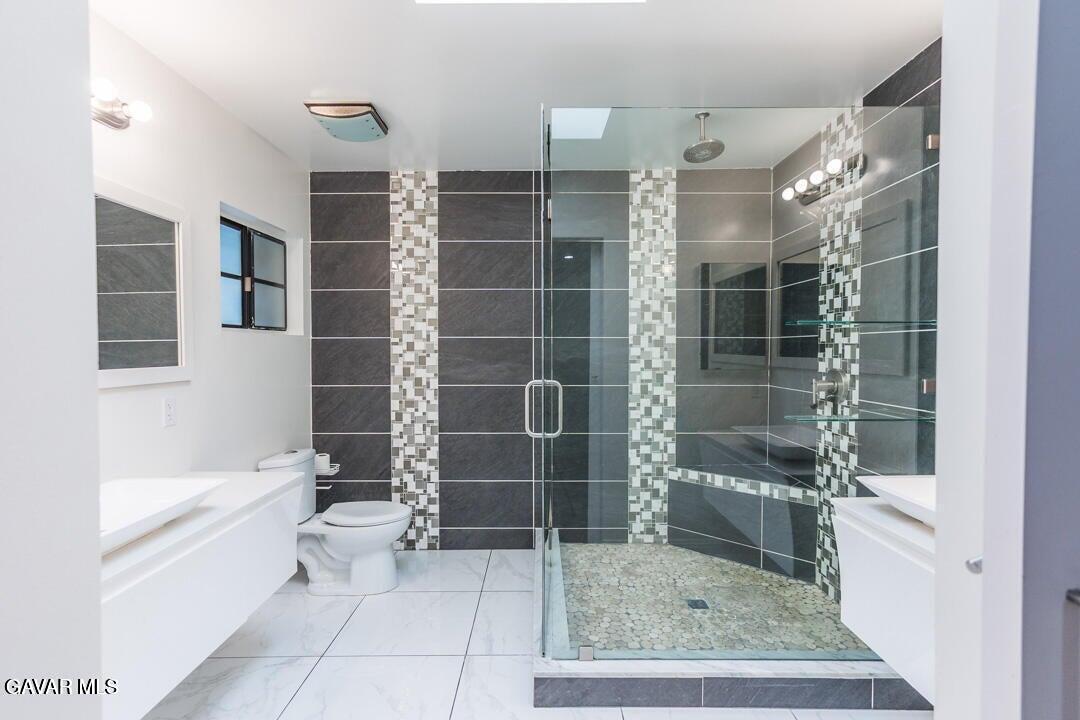 18452 Lemarsh Street, Unit 48 Northridge, CA 91325 - Photo 30 of 45 a bathroom with a shower