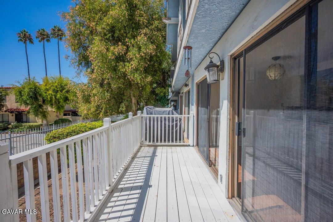 18452 Lemarsh Street, Unit 48 Northridge, CA 91325 - Photo 36 of 45 a view of a wooden fence from a balcony