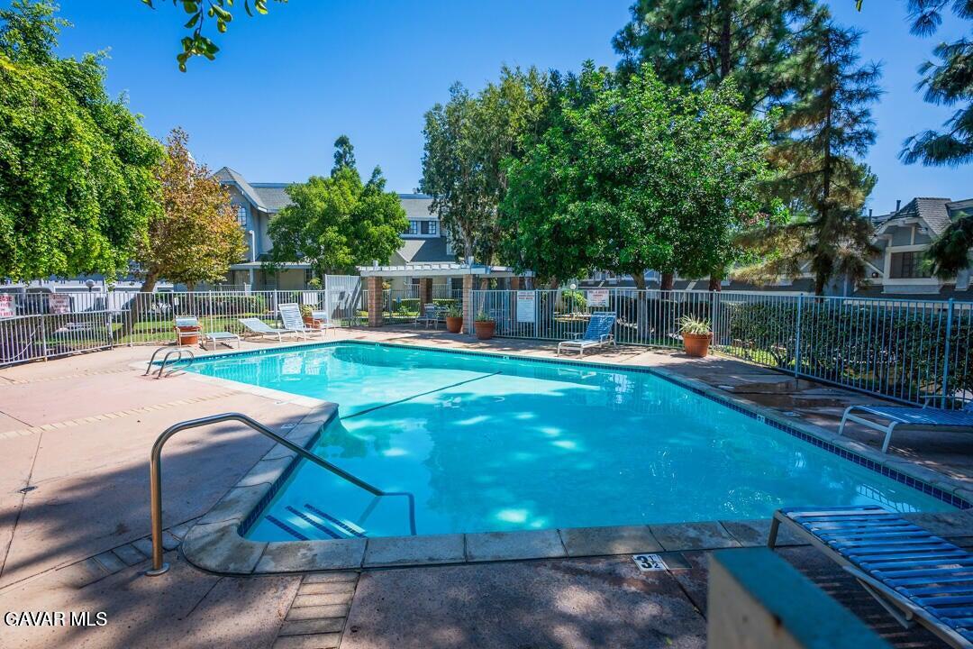 18452 Lemarsh Street, Unit 48 Northridge, CA 91325 - Photo 37 of 45 a view of a swimming pool with a patio