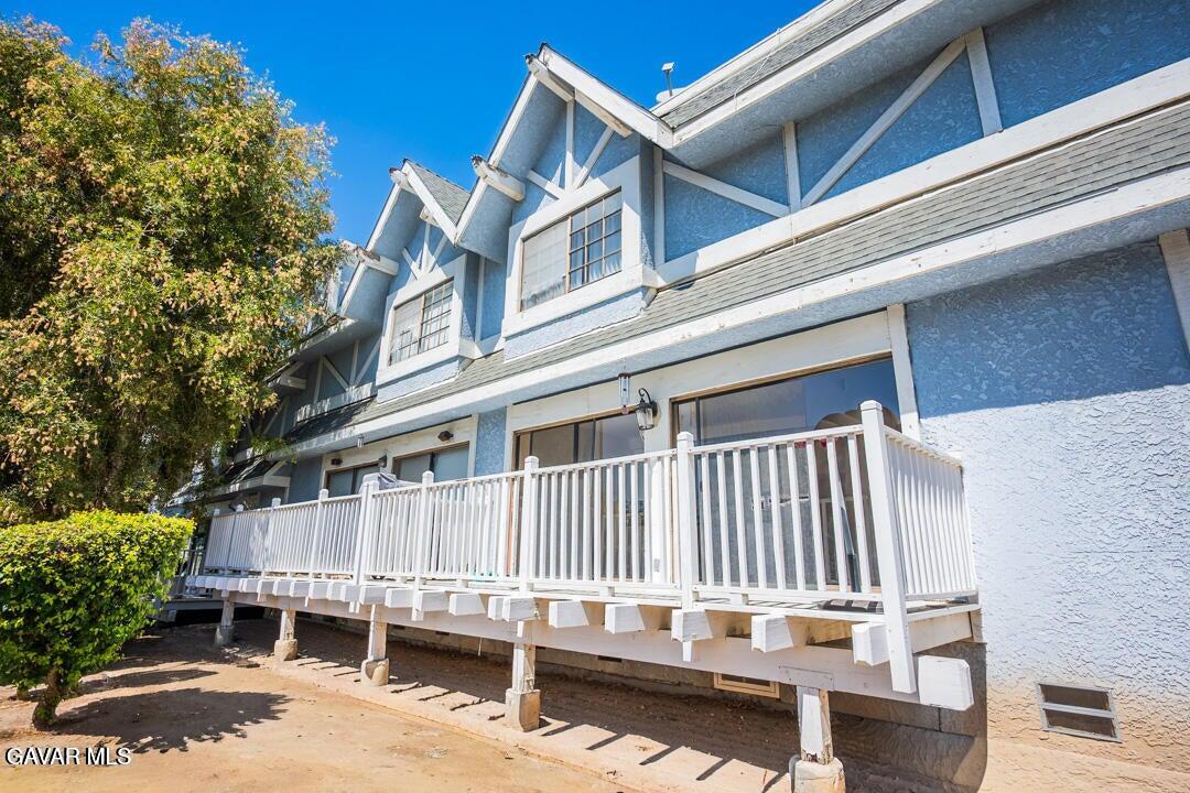 18452 Lemarsh Street, Unit 48 Northridge, CA 91325 - Photo 39 of 45 a view of a house with a deck