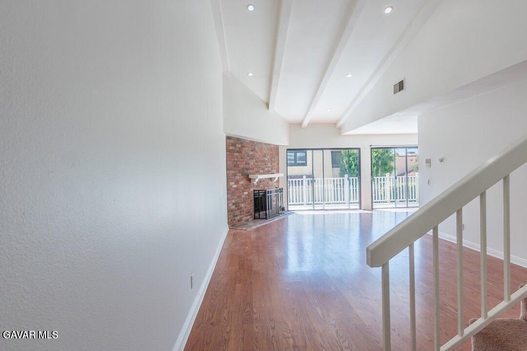 18452 Lemarsh Street, Unit 48 Northridge, CA 91325 - Photo 4 of 45 a view of an entryway with wooden floor