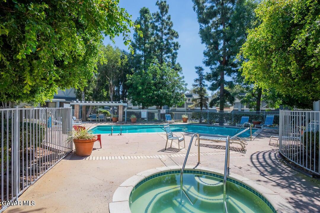 18452 Lemarsh Street, Unit 48 Northridge, CA 91325 - Photo 43 of 45 a view of a swimming pool with a patio