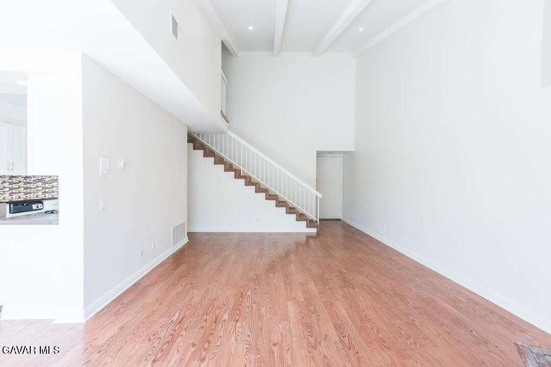 18452 Lemarsh Street, Unit 48 Northridge, CA 91325 - Photo 6 of 45 a view of entryway and hall with wooden floor