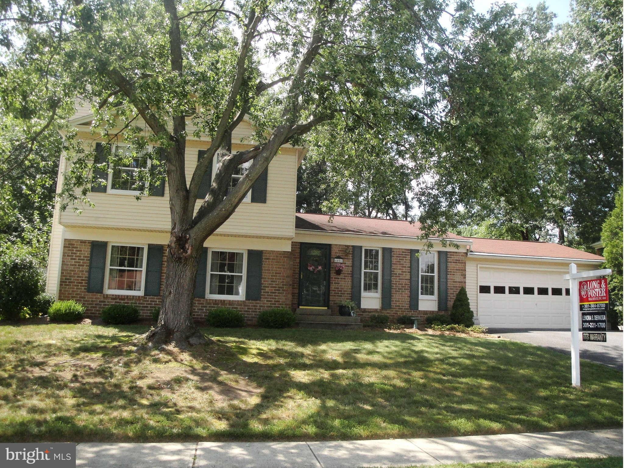 6406 Darwin Road Laurel, MD 20707 - Photo 1 of 22 front view of a house with a yard
