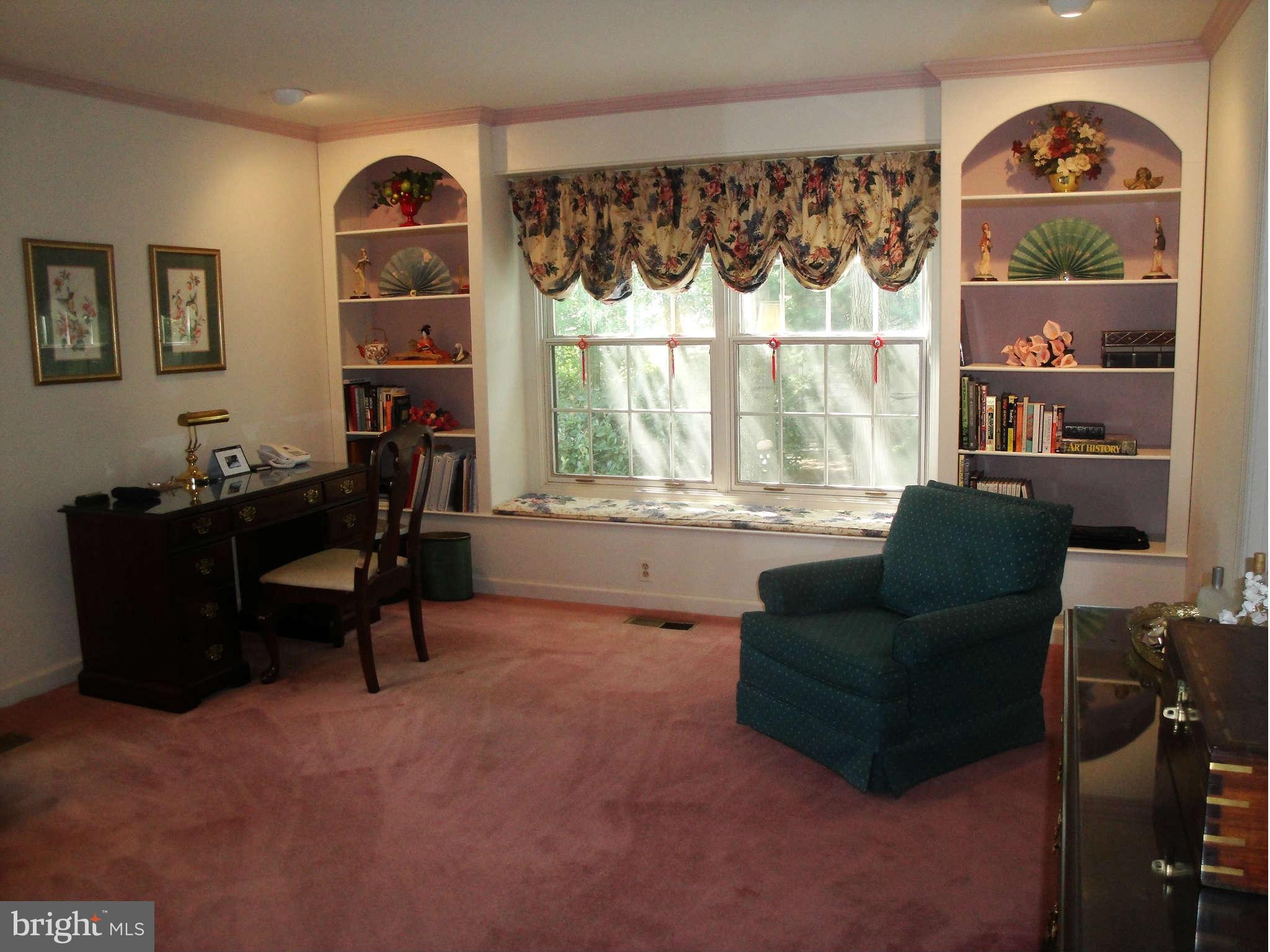 6406 Darwin Road Laurel, MD 20707 - Photo 13 of 22 a living room with furniture and a window