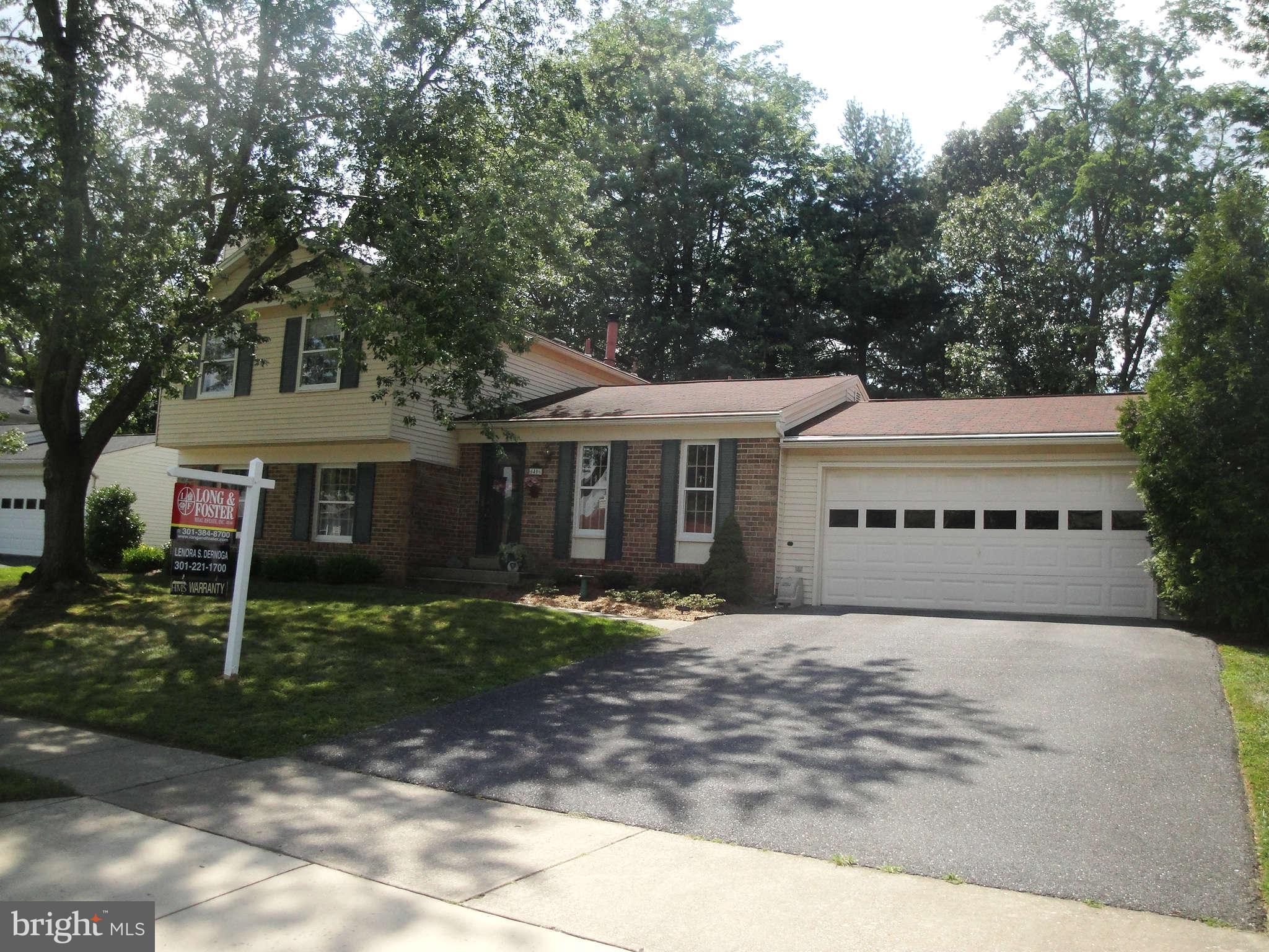6406 Darwin Road Laurel, MD 20707 - Photo 22 of 22 a front view of a house with a yard