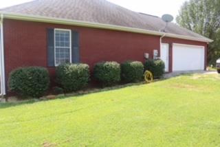 475 Tom Grissom Road Morrison, TN 37357 - Photo 14 of 17 a view of a backyard with plants