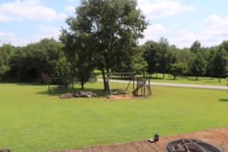 475 Tom Grissom Road Morrison, TN 37357 - Photo 16 of 17 a view of a swimming pool with a yard