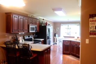 475 Tom Grissom Road Morrison, TN 37357 - Photo 5 of 17 a kitchen with a sink stove and cabinets