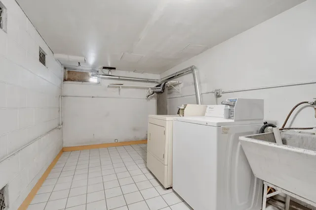 a view of a storage & utility room with racks on the wall