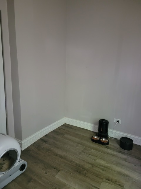 6016 South Carpenter Street Chicago, IL 60621 - Photo 15 of 15 a view of a workspace with wooden floor
