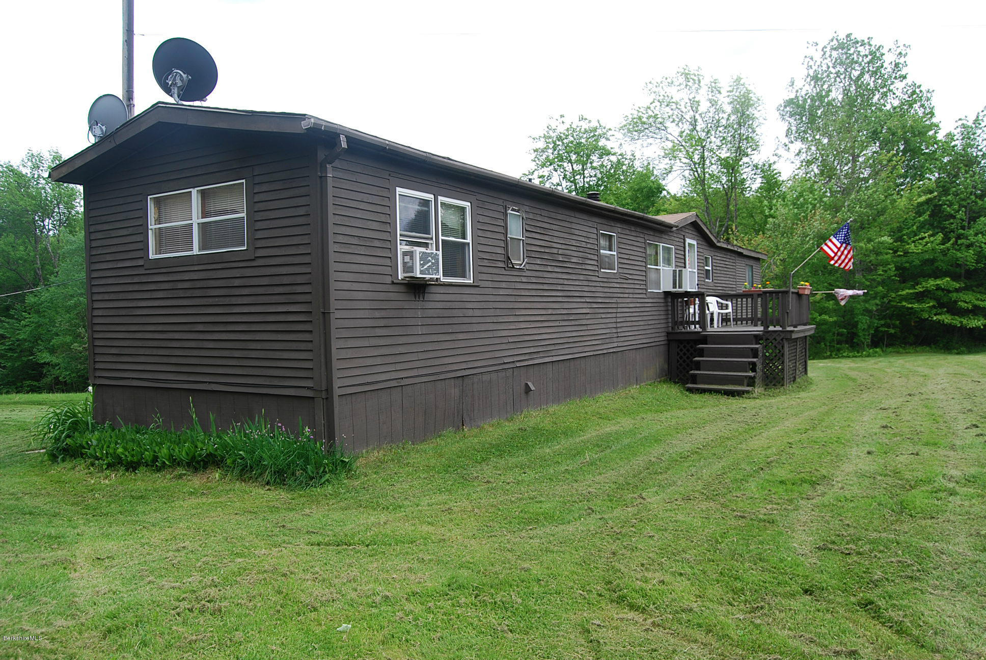 196 Chapel Road Savoy, MA 01256 - Photo 2 of 22 a view of a house with a backyard