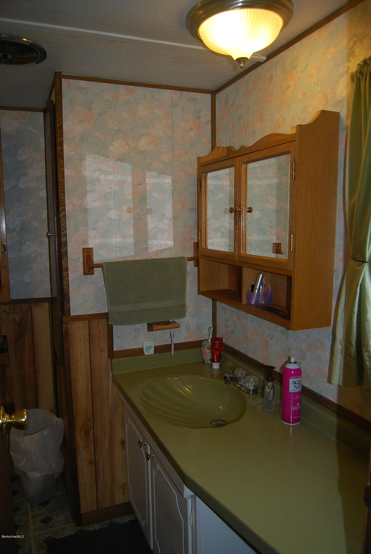 196 Chapel Road Savoy, MA 01256 - Photo 15 of 22 a kitchen with a sink and a refrigerator