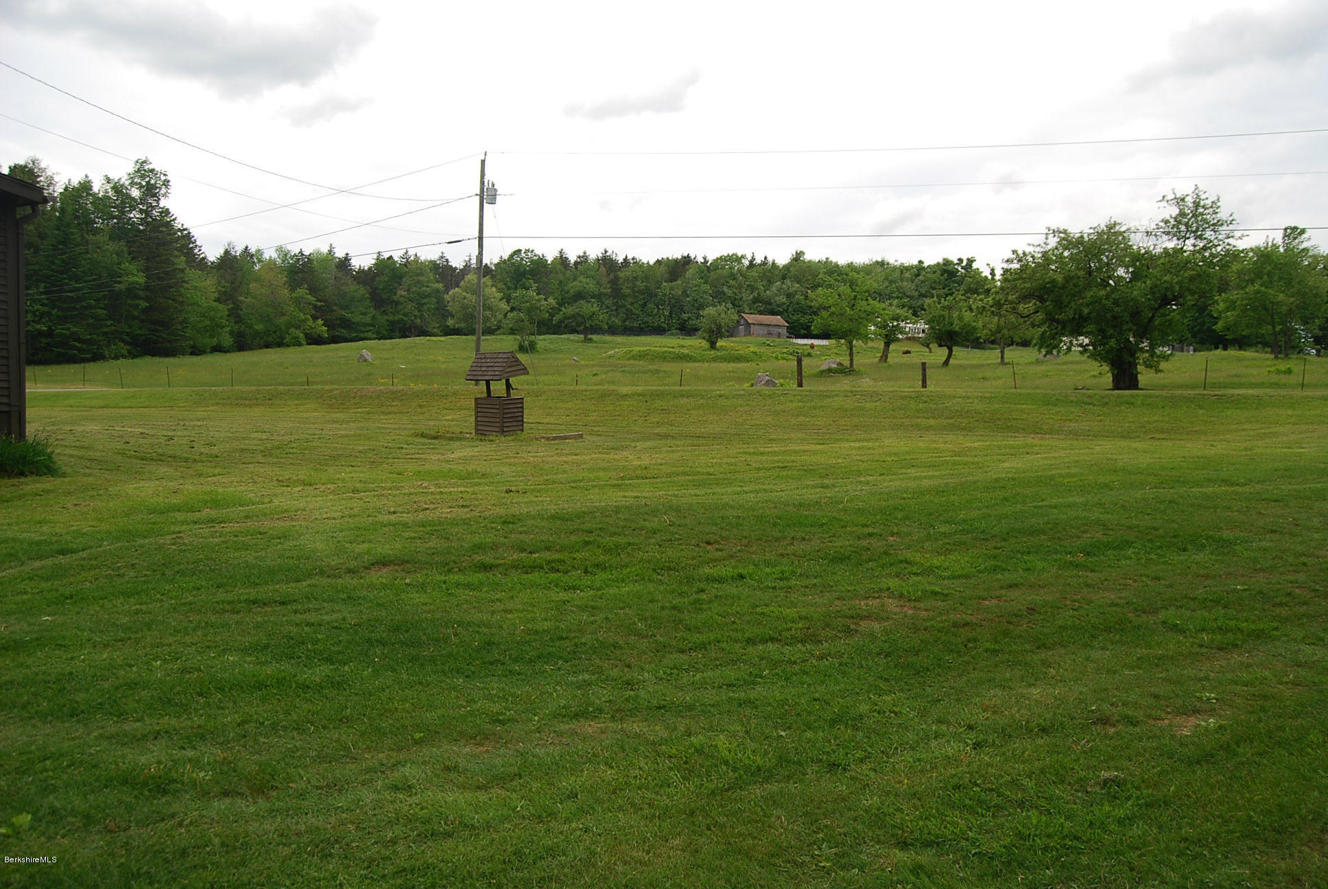 196 Chapel Road Savoy, MA 01256 - Photo 20 of 22 a front view of a house with a big yard