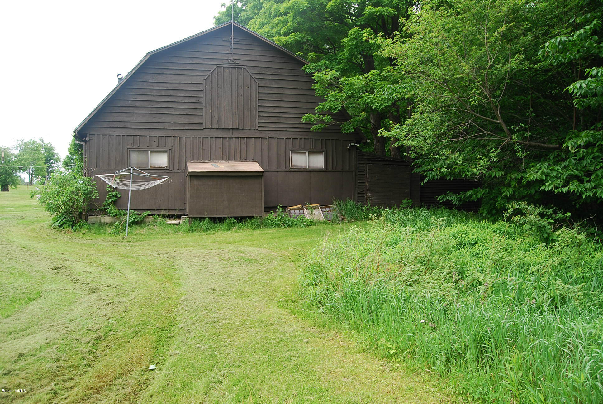 196 Chapel Road Savoy, MA 01256 - Photo 5 of 22 a backyard of a house with lots of green space