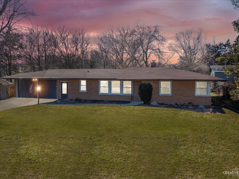 12-n058 Randall Road Elgin, IL 60123 - Photo 21 of 23 a front view of a house with a yard