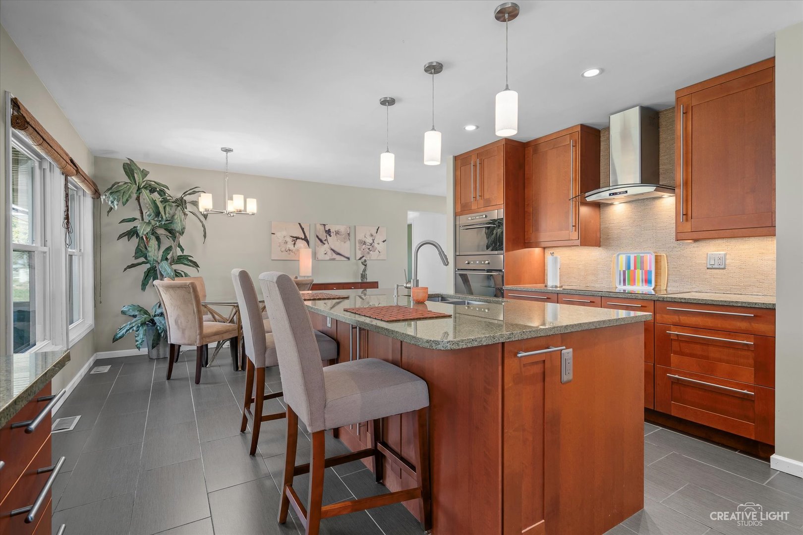 12-n058 Randall Road Elgin, IL 60123 - Photo 7 of 23 a large kitchen with a table and chairs