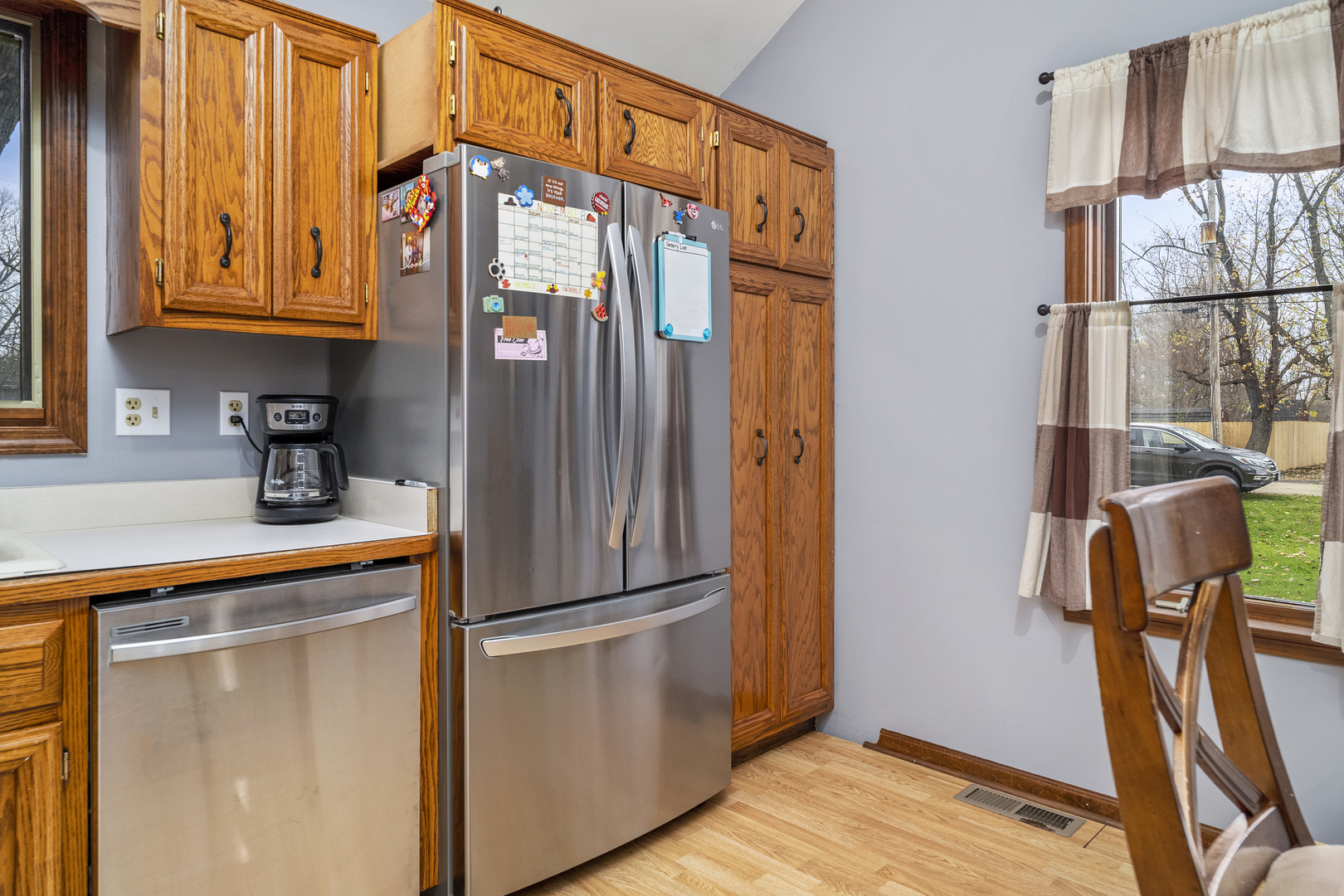111 East Schmidt Road Braidwood, IL 60408 - Photo 8 of 23 a kitchen with stainless steel appliances granite countertop a refrigerator and a sink