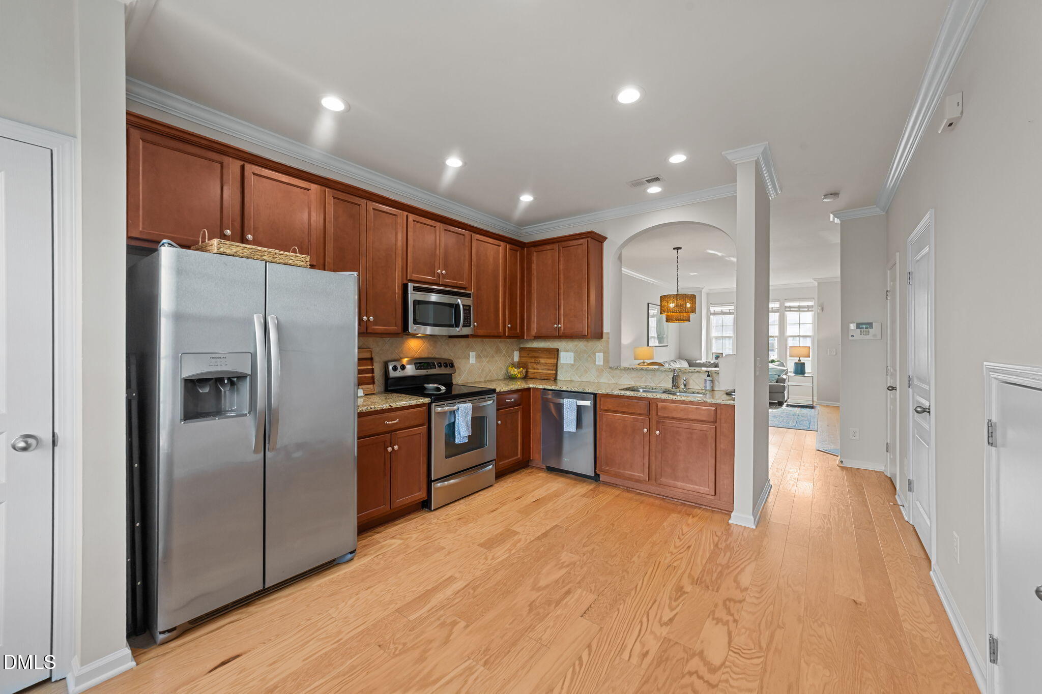 807 Cupola Drive Raleigh, NC 27603 - Photo 10 of 34 Kitchen to living room