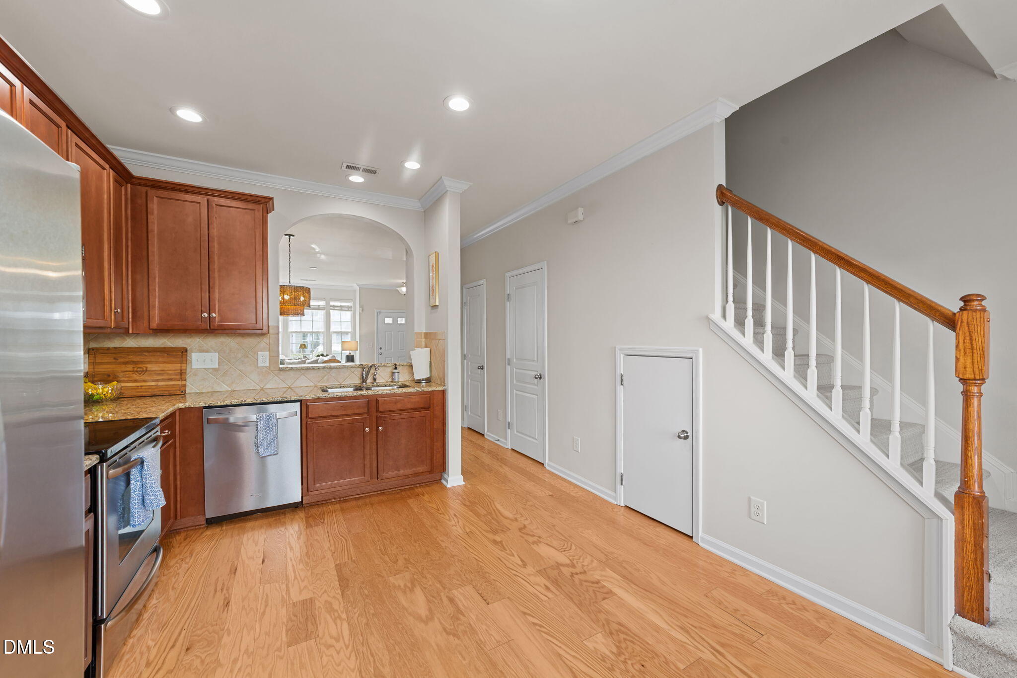 807 Cupola Drive Raleigh, NC 27603 - Photo 12 of 34 Kitchen and guest bathroom