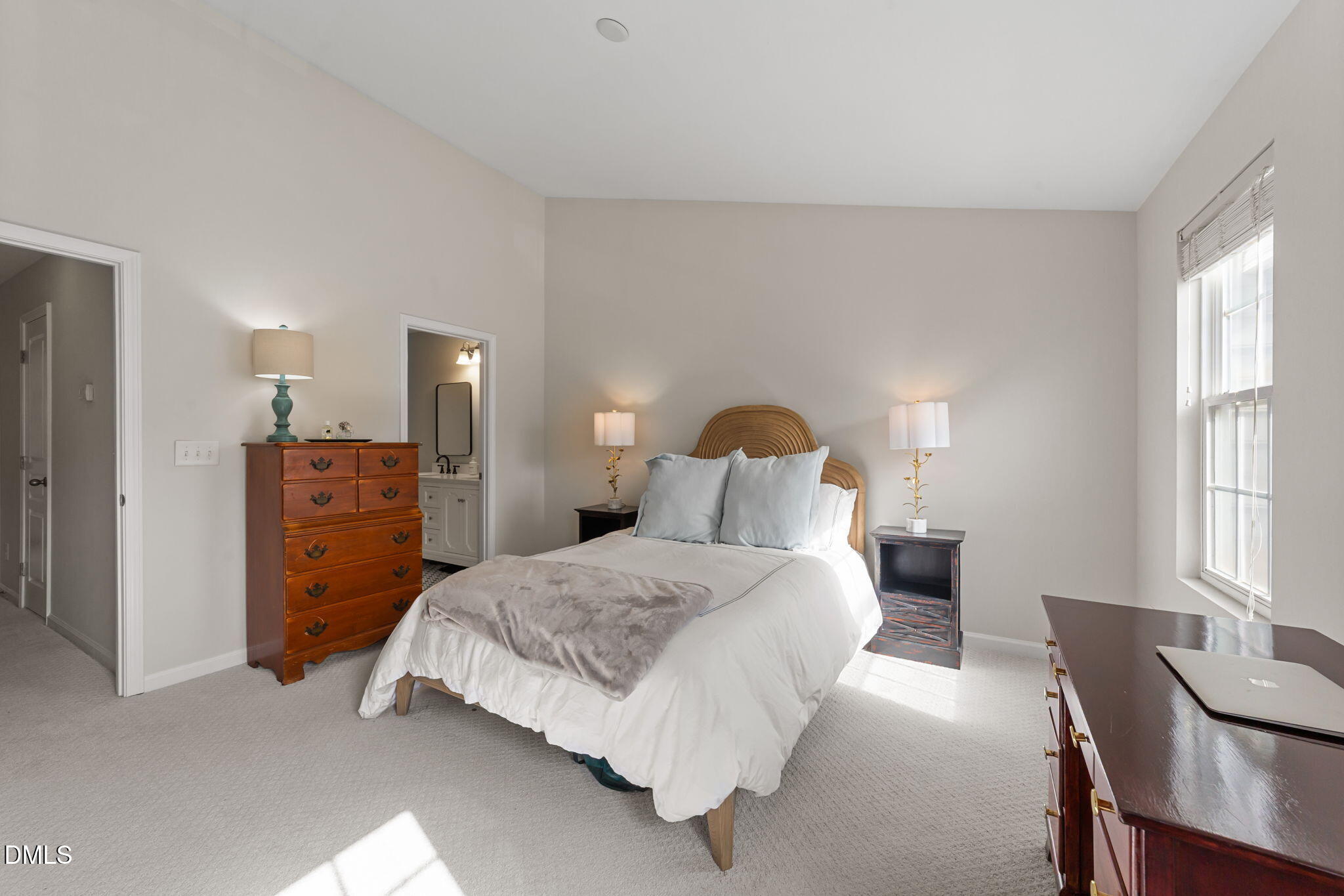 807 Cupola Drive Raleigh, NC 27603 - Photo 17 of 34 Primary bedroom with ensuite bath