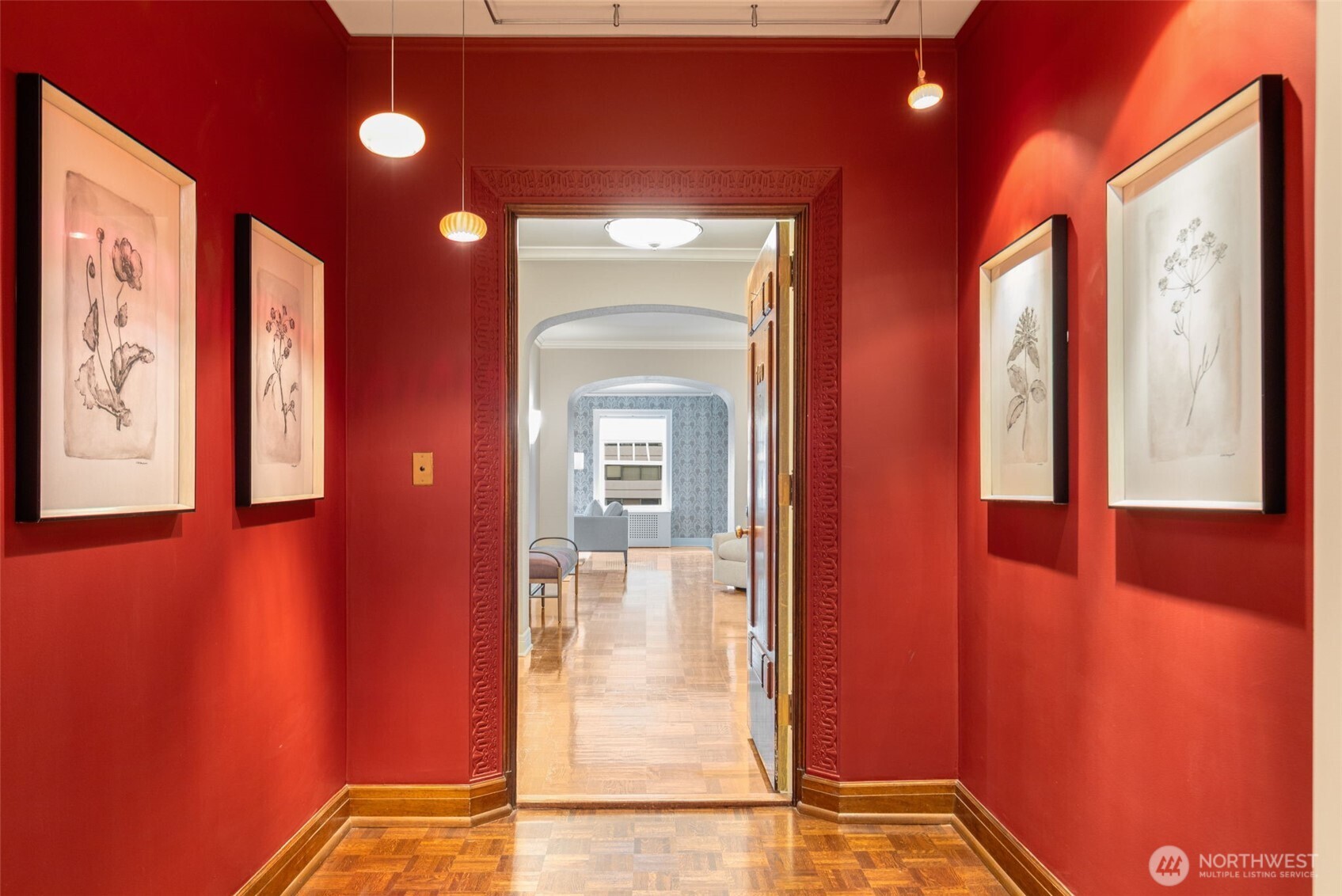 1223 Spring Street, Unit 700 Seattle, WA 98104 - Photo 3 of 35 a view of a hallway with windows and yard